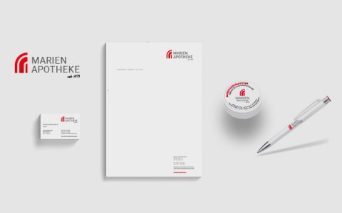 Corporate Design für die Marien-Apotheke. Logo, Briefbogen, Visitenkarten, Kugelschreiber und Dose.