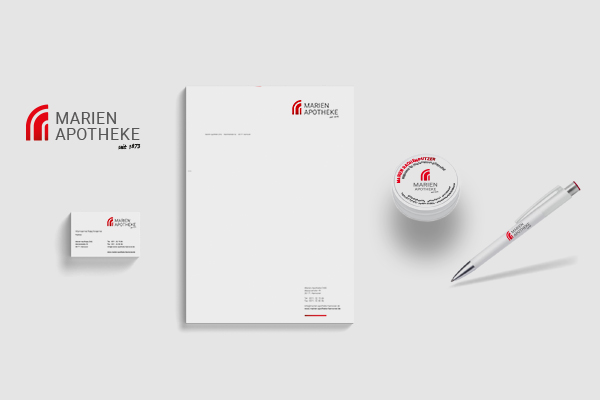 Corporate Design für die Marien-Apotheke. Logo, Briefbogen, Visitenkarten, Kugelschreiber und Dose.